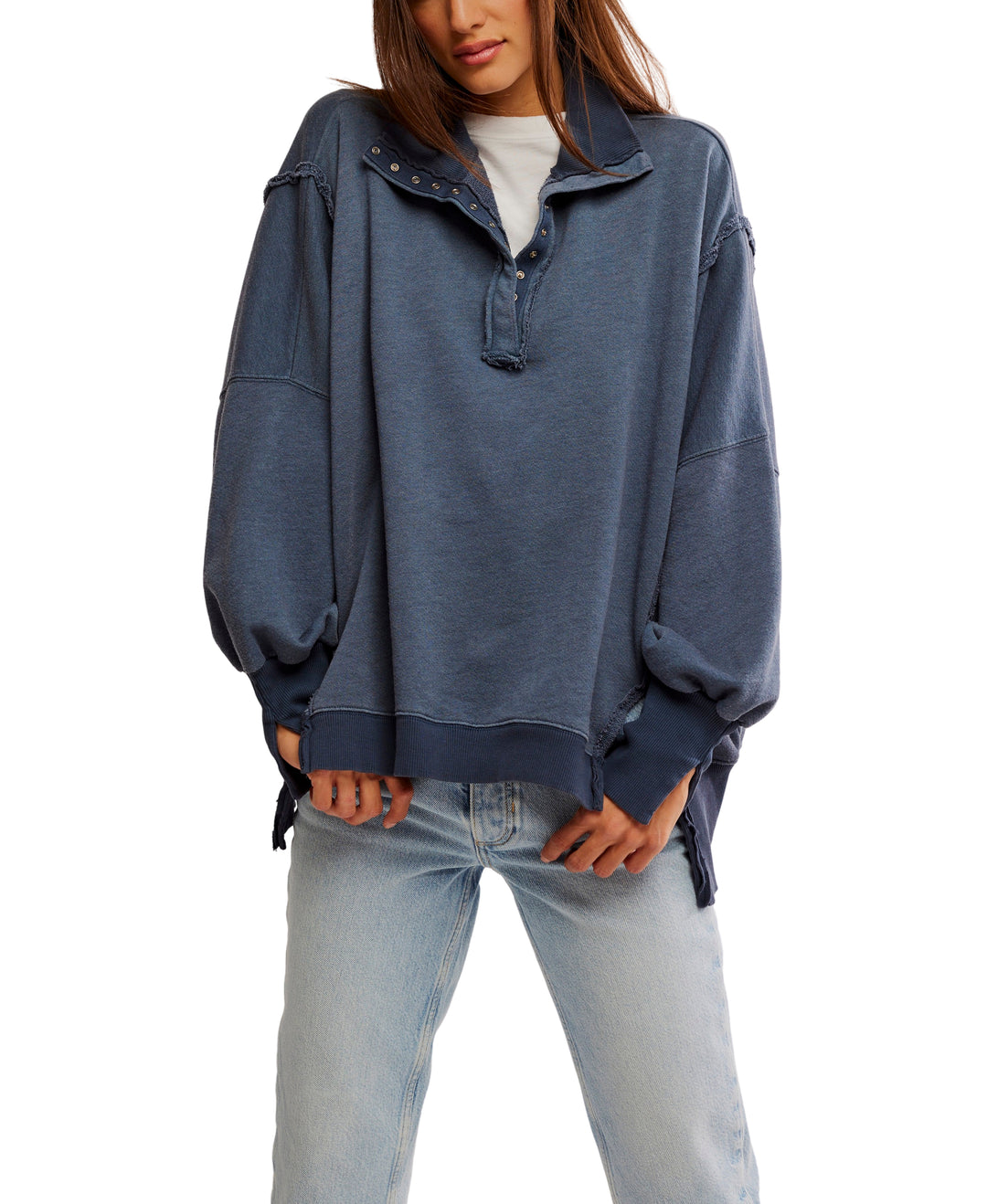 Oversized Camden Henley Sweatshirt in Navy by Free People with snap-button closures, drop shoulders, and side slits.




